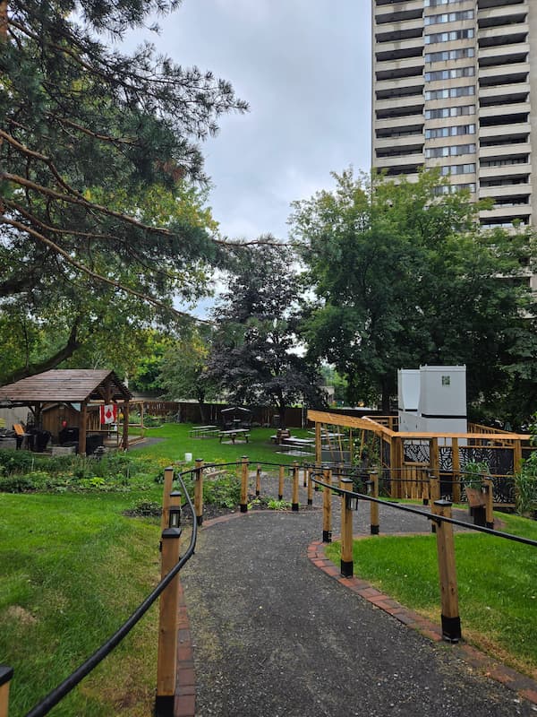 Garden paths, trees and gathering spaces at Ambleside 2.